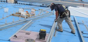 Thermal Systems crew repairing a commercial roof